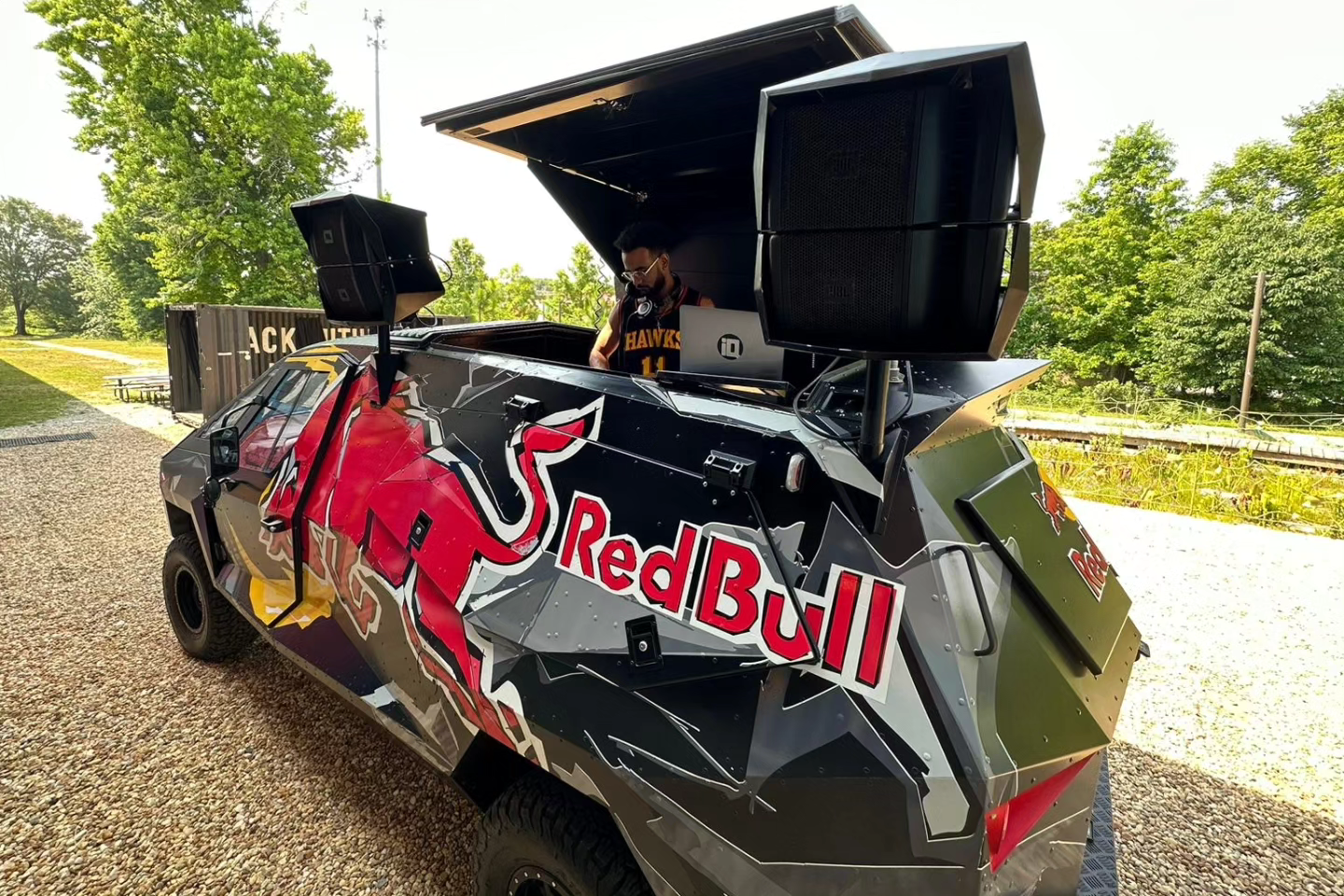 DJ IQ performing from a custom Red Bull event vehicle