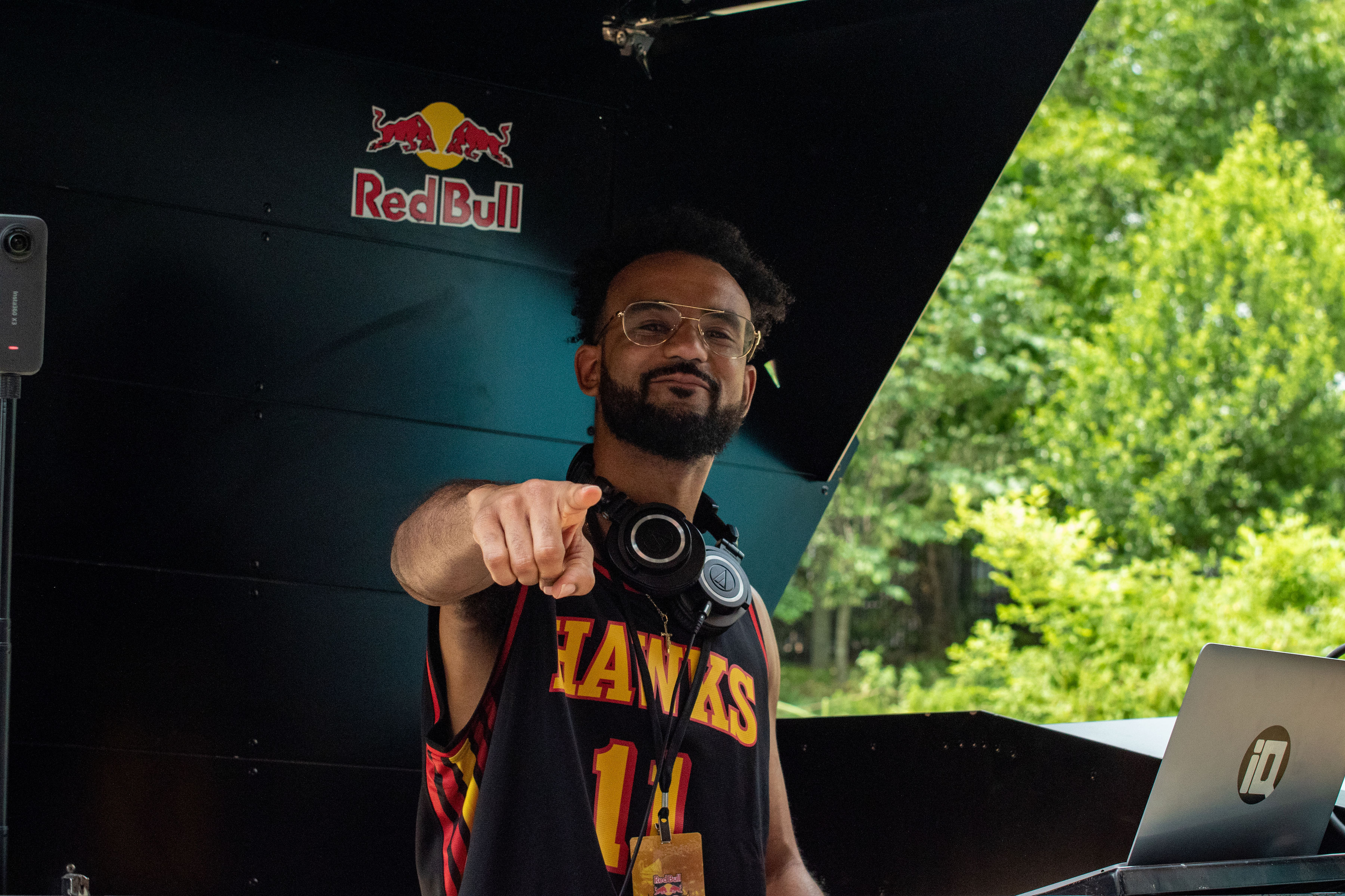DJ IQ performing from a Red Bull event vehicle